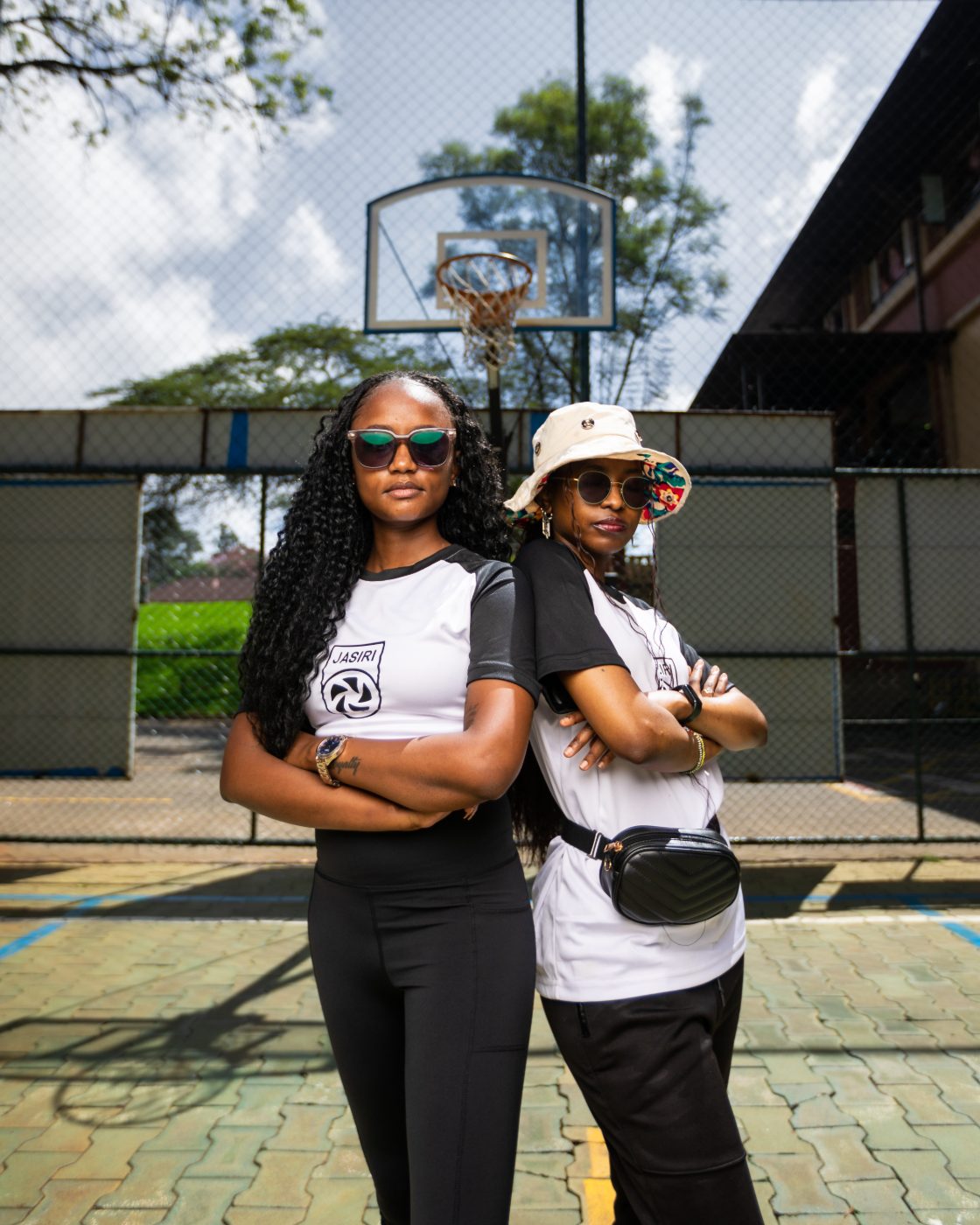 Two Jasiri athletes on court